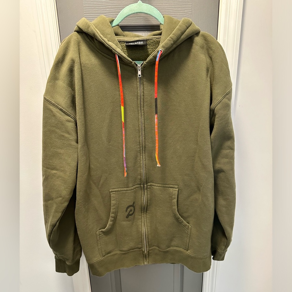 Peloton unisex long length zip up hooded sweatshirt. Size XL